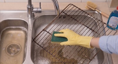 Cleaning oven racks in kitchen sink