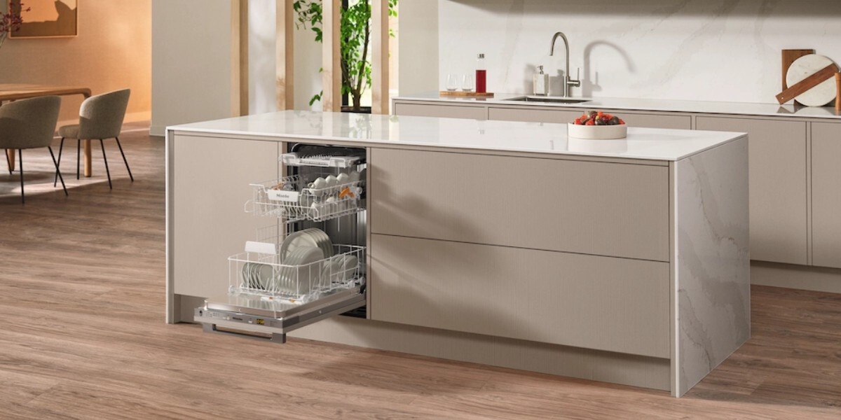 A Miele brand slimline 45cm width dishwasher in a contemporary kitchen