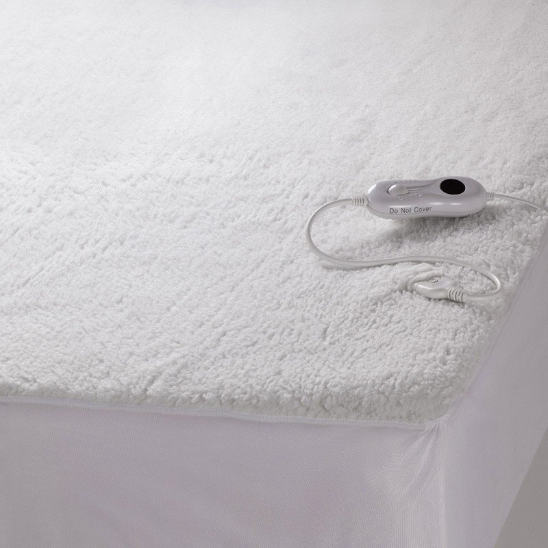 An electric blanket is one of the most efficient ways to stay warm at night because it heats just your immediate vicinity.