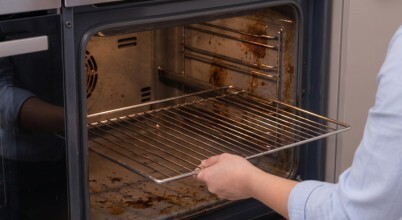 Removing an oven rack from an oven