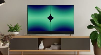 A Hubbl Glass TV on an entertainment unit in a contemporary living room